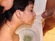 While taking a leak this mature slut gets wet